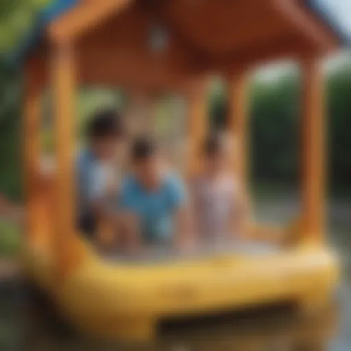 Children Playing in Little Tikes Playhouse with Water Table