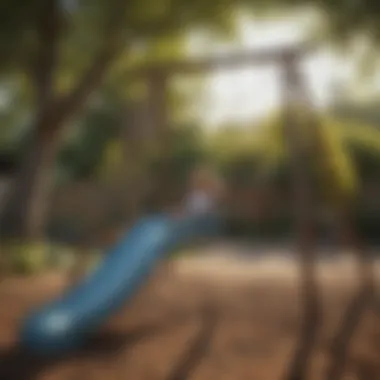 Children playing on small swing set with slide in backyard