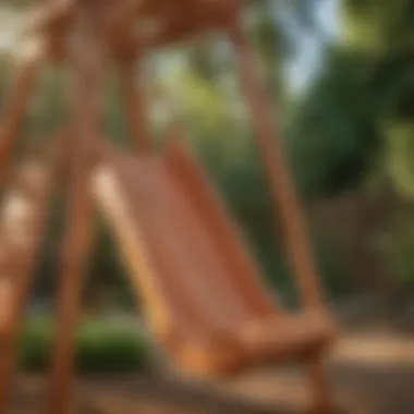 Close-up of small swing set with slide details and sturdy construction